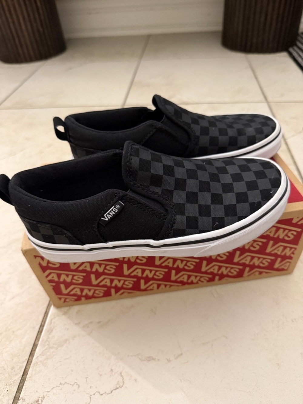 Vans Kids Slip-On Sneakers in Black Checkerboard